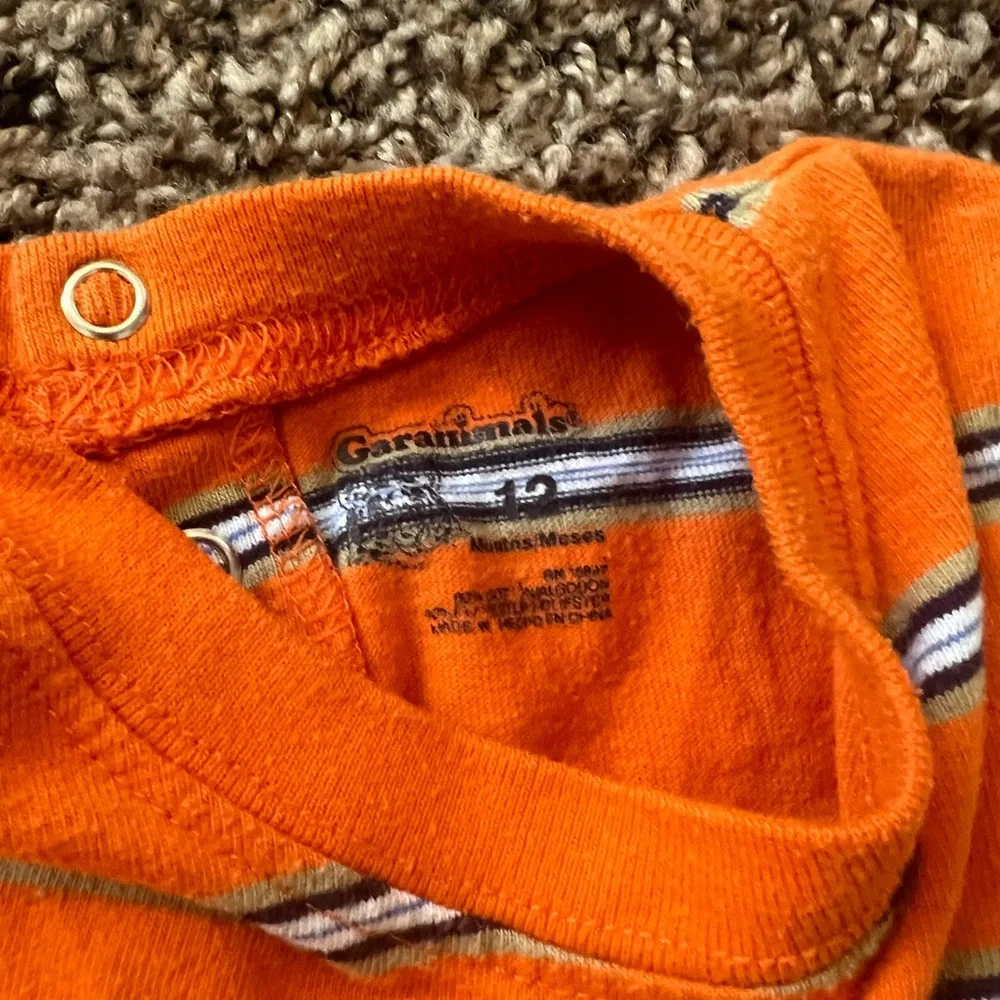 Orange striped onesie